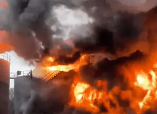 Incêndio de grandes proporções em distribuidora de combustível persiste após 12 horas