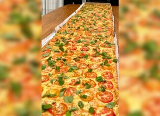 Balneário Camboriú faz história com pizza de 61 metros e distribuição gratuita